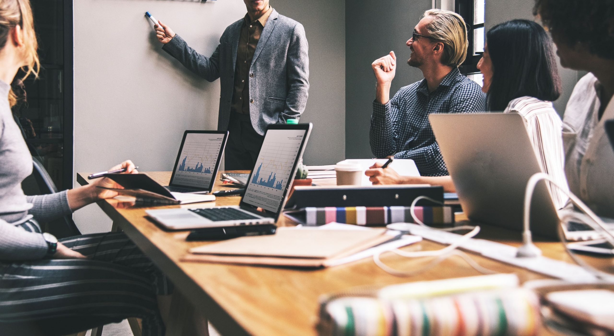 group of diverse people having a business meeting scaled